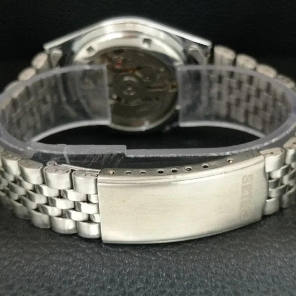 Vintage 1989 Seiko Automatic Mens Silver Watch W/daydate & White accents